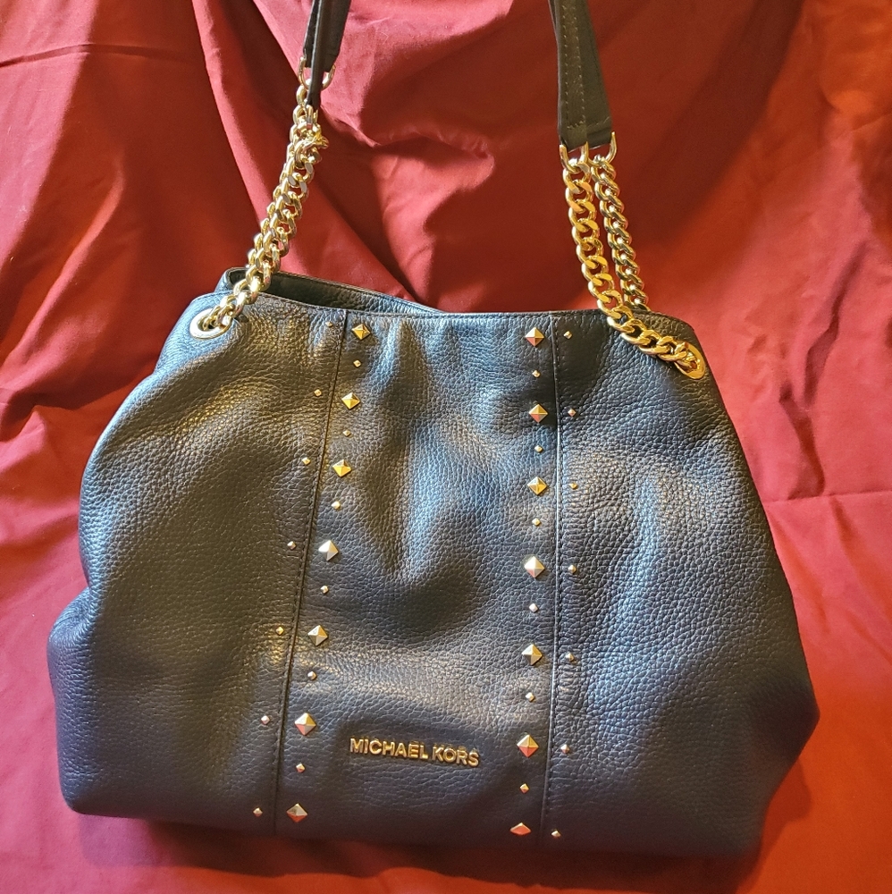 Blue Michael Kors handbag and matching wallet